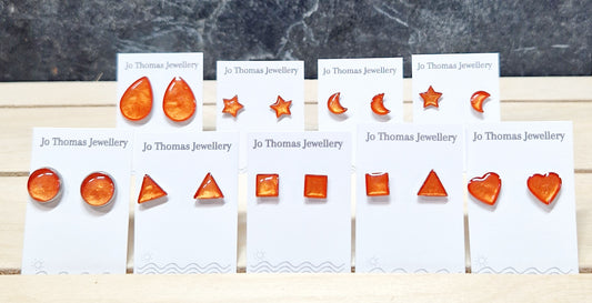Stainless steel mini studs range Iridescent Orange