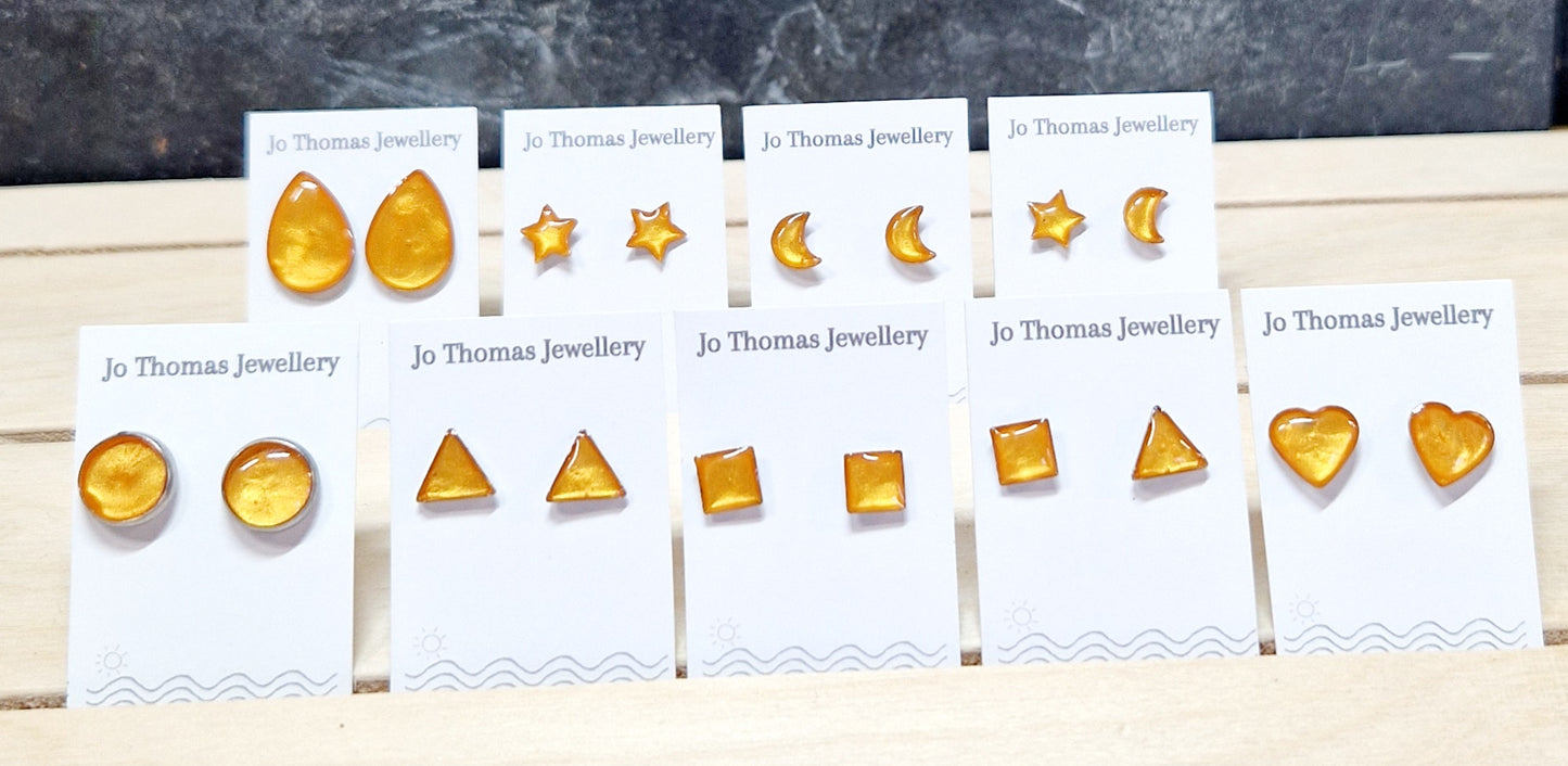 Stainless steel mini studs range Zesty Orange